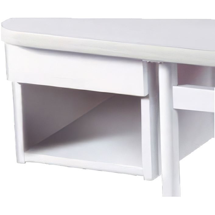 White vanity table corner detail showing a curved top, a drawer, and an open shelf on a plain white background.
