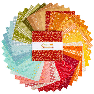 Baked With Love 10" fabric squares fanned out in colorful coordinating prints on a white background.