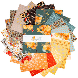 A bundle of patterned fabric sheets fanned out behind a central package label reading 'Secret Garden' and '16-count fabric bundle.' The fabrics feature autumn and floral motifs in orange, yellow, teal, brown, cream, and red, shown on a plain white background.