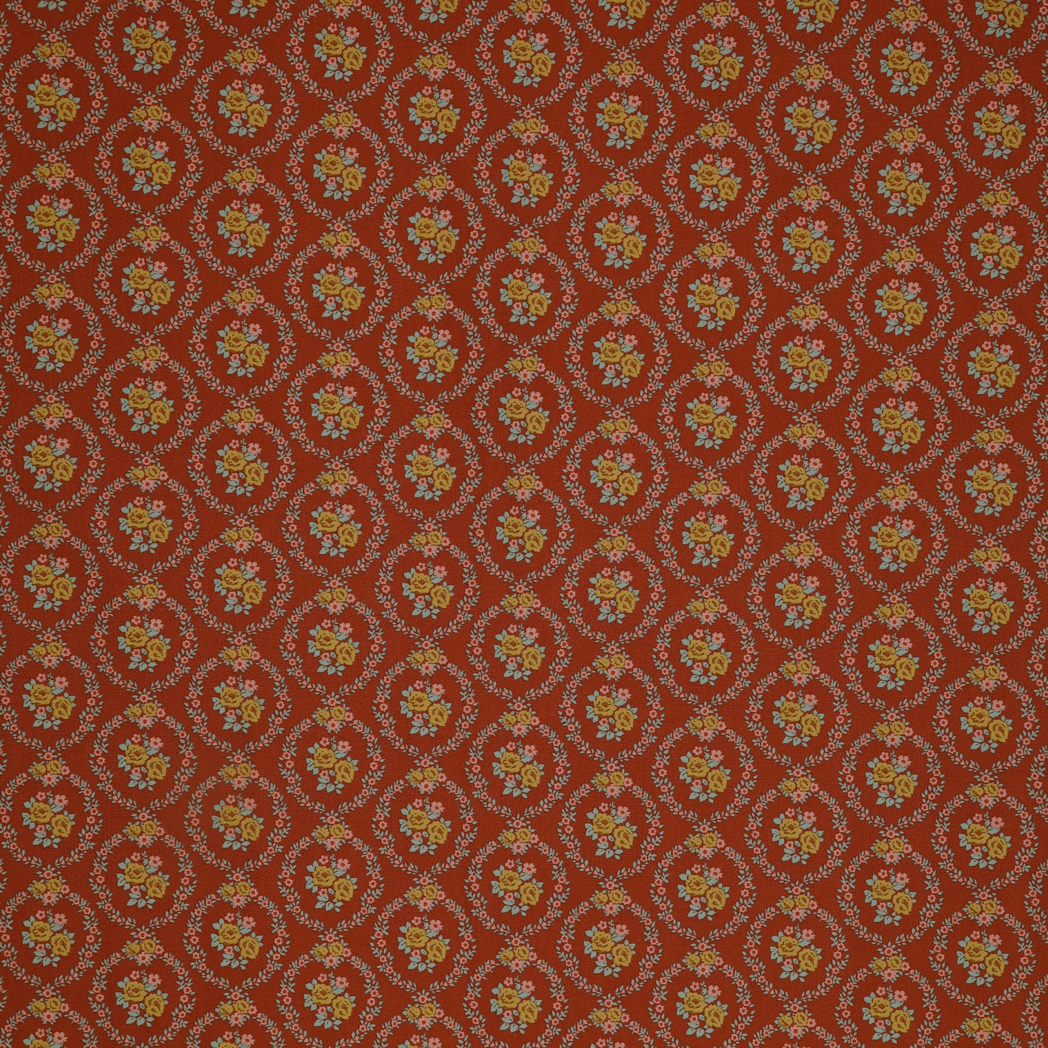 Village Life Fabric Collection - Mable Rust: Rust with yellow rose bouquets framed by teal and pink floral wreaths in a repeating pattern TIL100687-MABLE-RUST