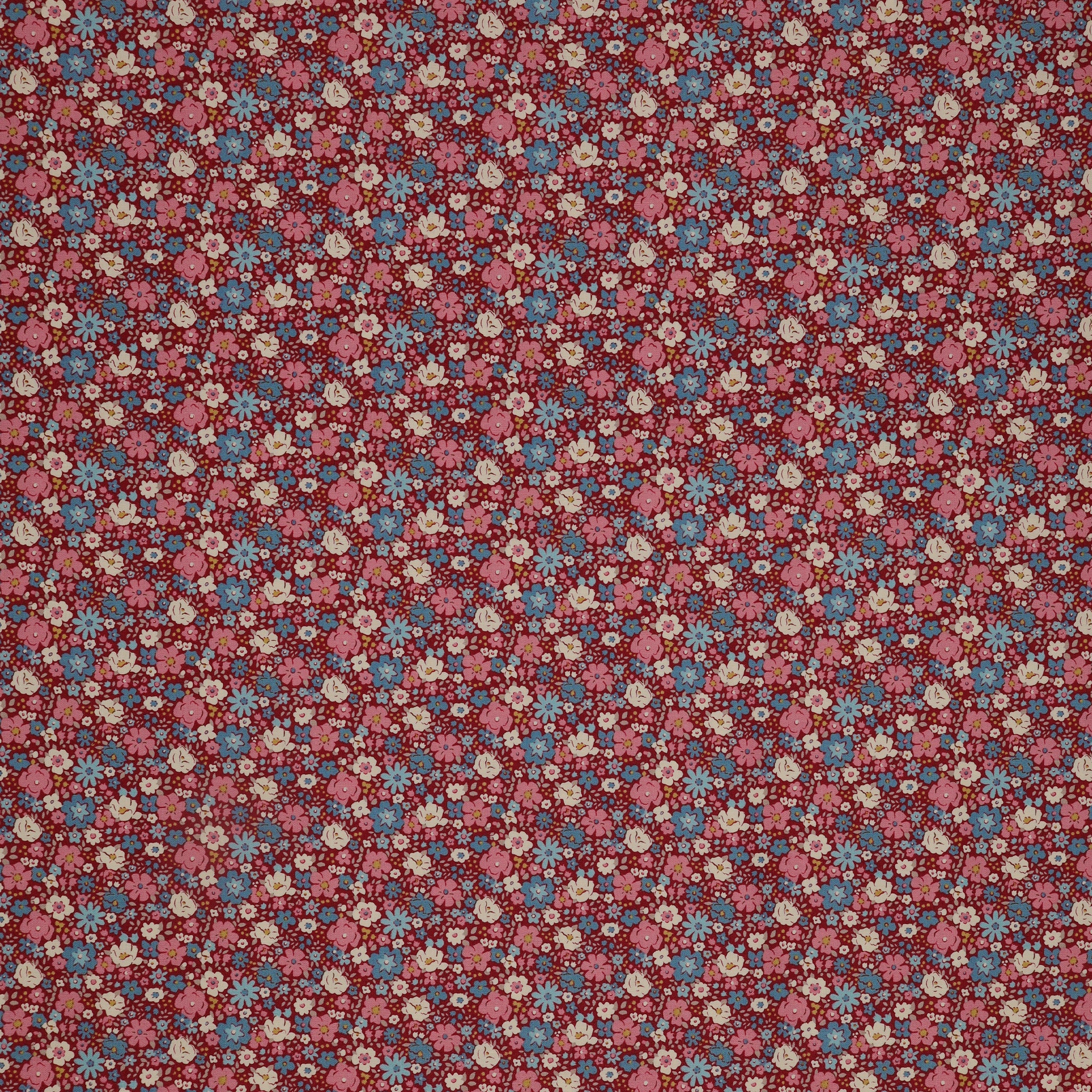 Village Life Fabric Collection - Esther Burgundy: burgundy with dense pink, blue, and cream flowers in a small-scale repeating floral pattern TIL100695-ESTHER-BURGUNDY