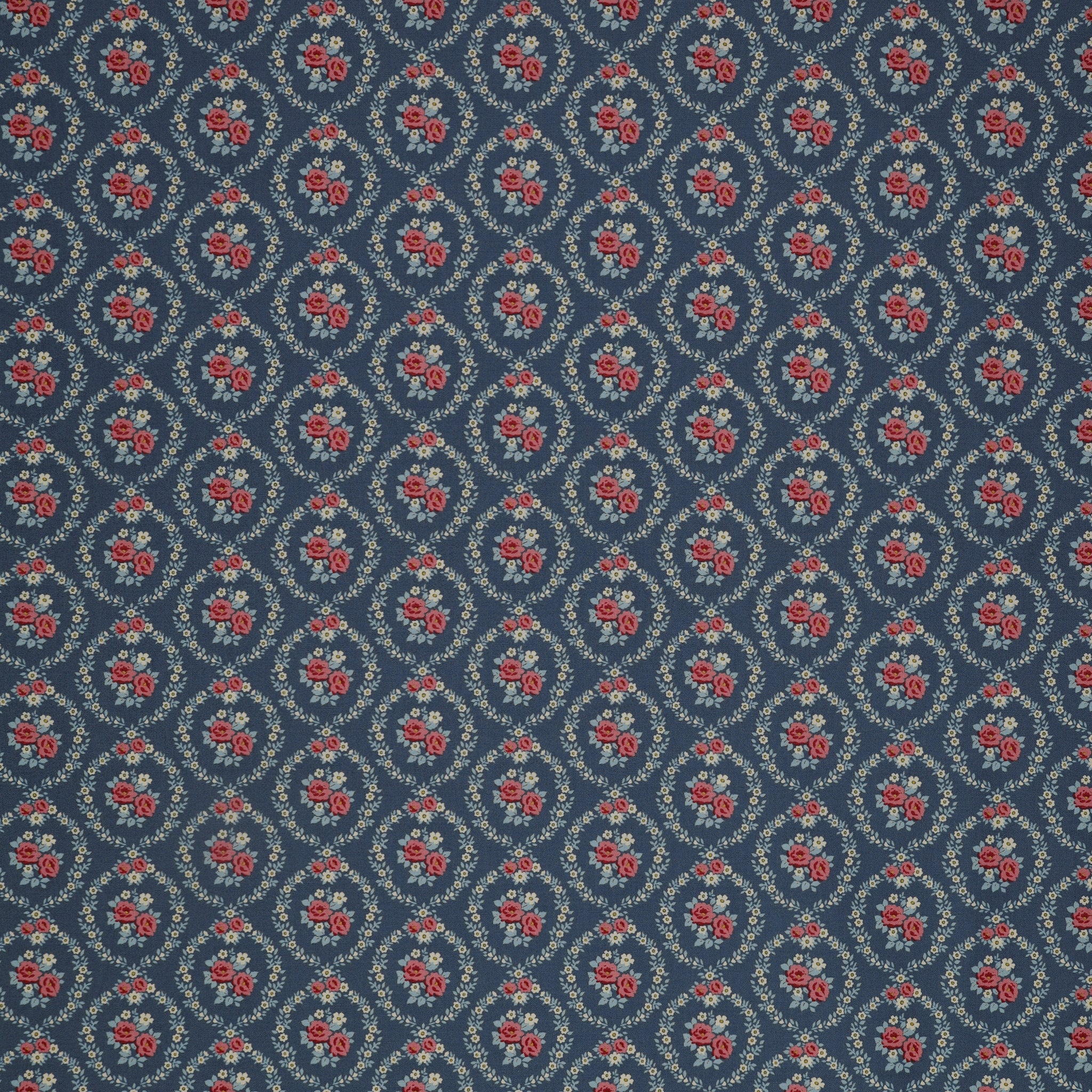 Village Life Fabric Collection - Mable Blue: Blue with pink rose bouquets framed by cream floral wreaths in a repeating pattern TIL100697-MABLE-BLUE