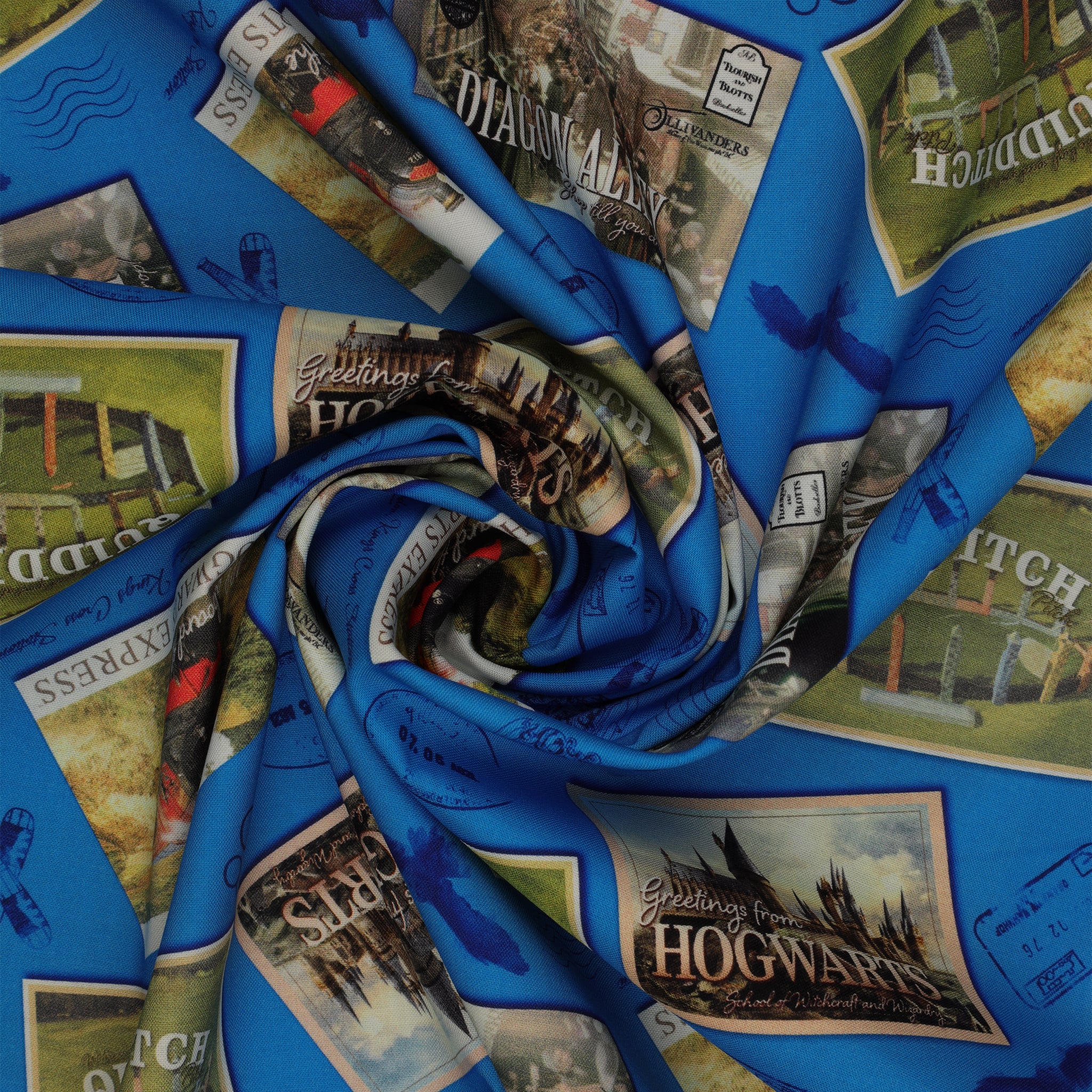 Royal-blue fabric with Hogwarts, Hogwarts Express, Diagon Alley and Quidditch postcards, plus postal marks in a swirl.
