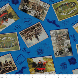 Royal-blue fabric with Hogwarts, Hogwarts Express, Diagon Alley and Quidditch postcards, plus postal marks with ruler for scale.
