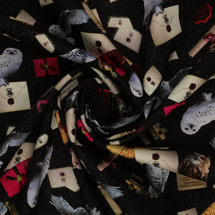White and brown owls, sealed letters, scrolls and books on black Harry Potter fabric with subtle scrollwork in a swirl.