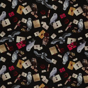 White and brown owls, sealed letters, scrolls and books on black Harry Potter fabric with subtle scrollwork.