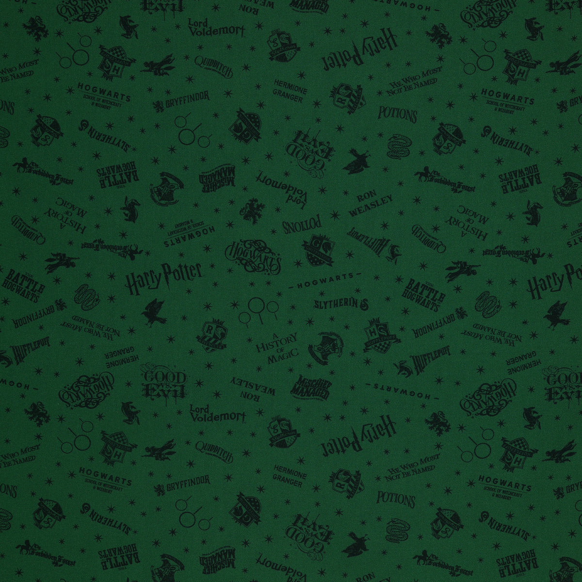 Dark green Harry Potter fabric with nearly black house crests, serpents, words and scattered stars.