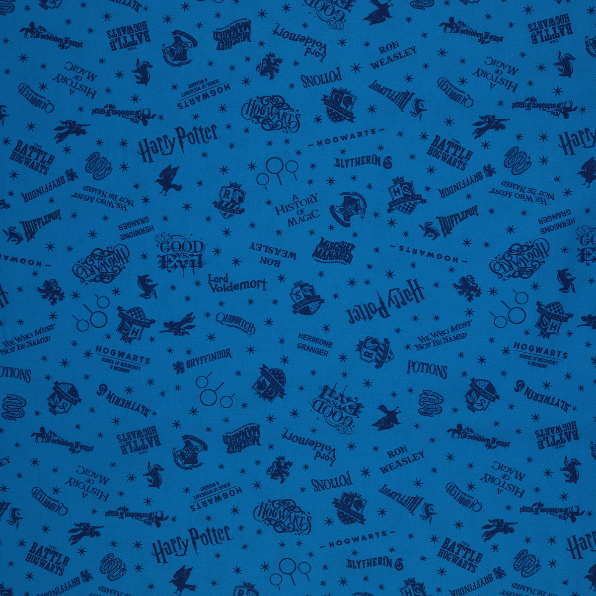 Blue Harry Potter fabric with navy lettering, house badges, Quidditch goalposts and small stars.