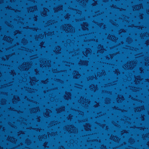 Blue Harry Potter fabric with navy lettering, house badges, Quidditch goalposts and small stars.