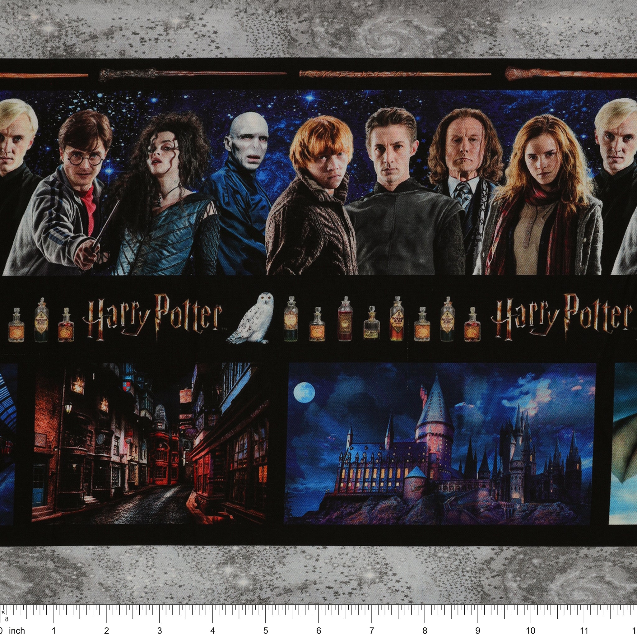 Harry Potter fabric with horizontal bands of film portraits, wands, potion bottles and scenes in blue, black and gray with ruler for scale.