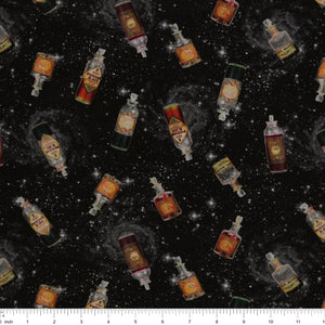 Black Harry Potter fabric with scattered potion bottles, antique-style labels, gray swirls and white stars with ruler for scale.