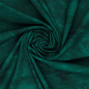 Teal mottled fabric from Benartex Bushel & Bloom Terra Nova collection, shown swirled to display texture