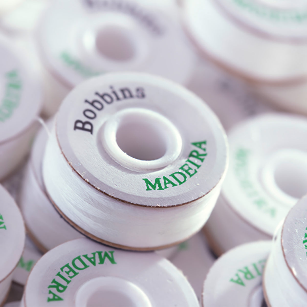 Close-up of Madeira prewound, white bobbin