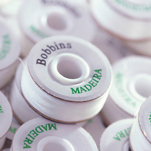 Close-up of Madeira prewound, white bobbin