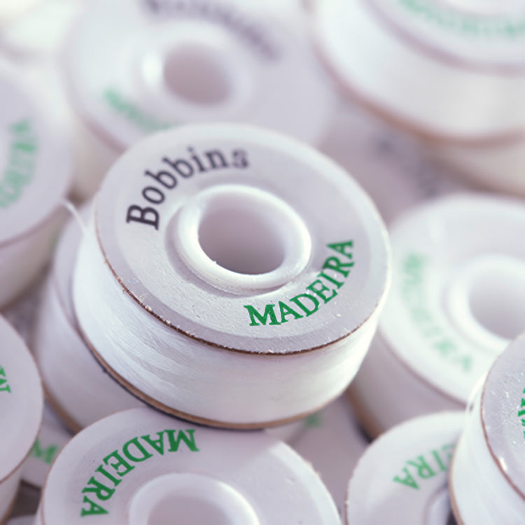 Close-up of Madeira prewound, white bobbin