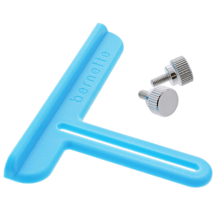 A bright blue T-shaped BERNETTE fabric guide with 2 screws, shown on a clean white background.