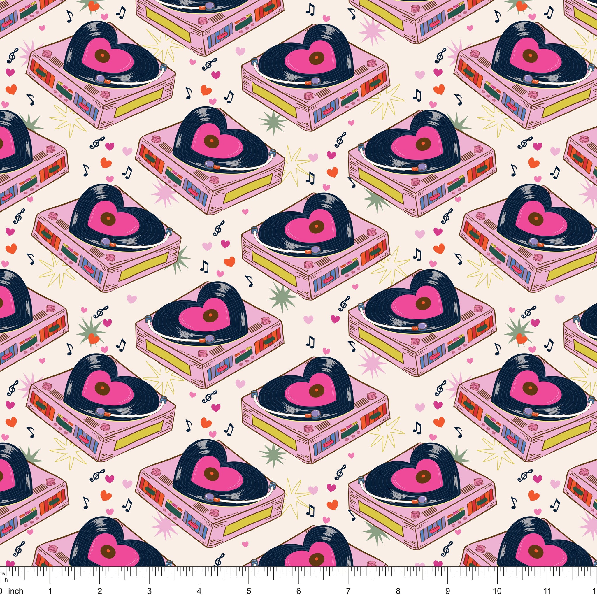 Cream fabric with pink turntables playing heart-shaped records, shown with ruler for scale