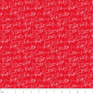 Red fabric with Perfectly Imperfect and Perfect Match script lettering, shown with ruler for scale