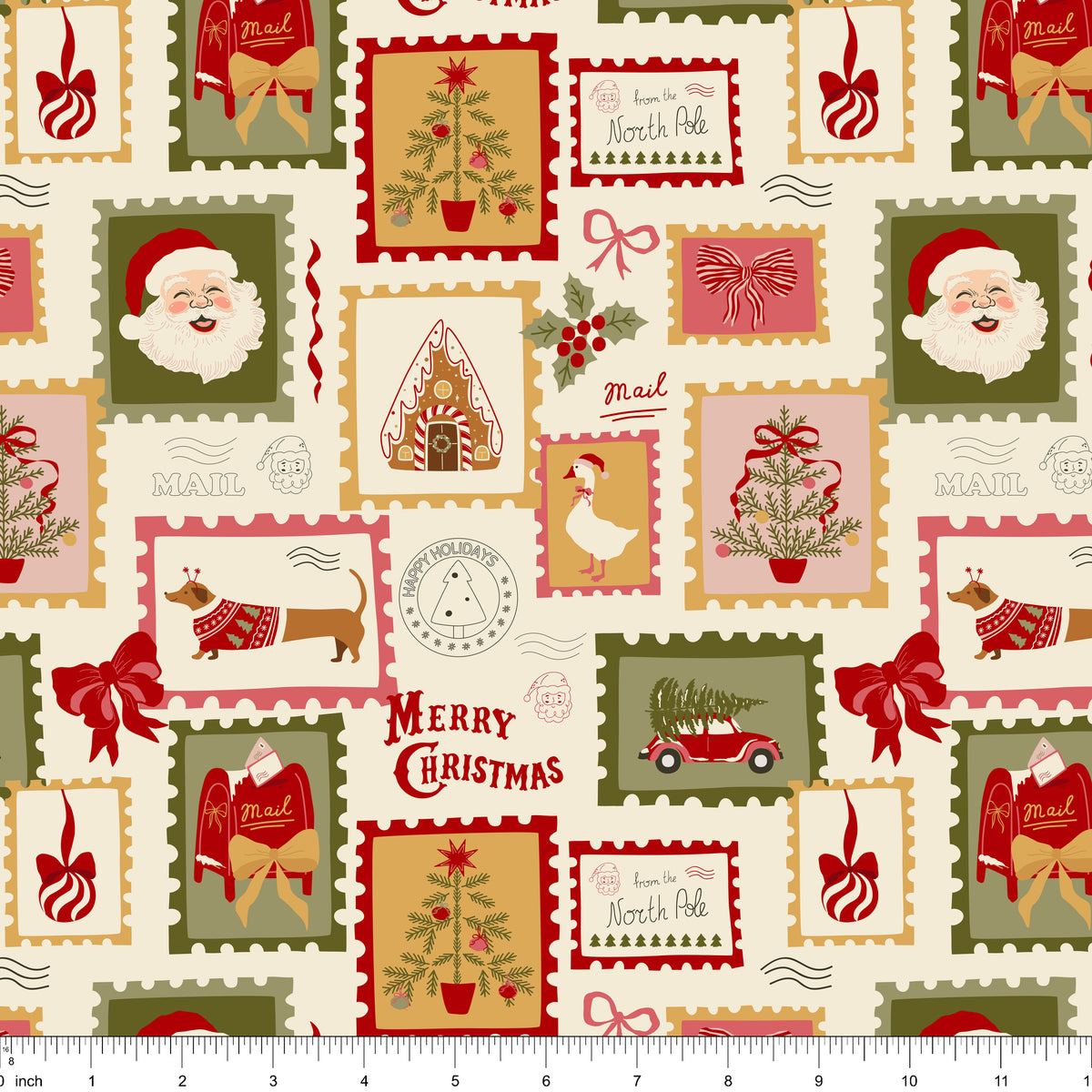 Cream fabric with Christmas postage stamps of Santa, a gingerbread house, a goose and a dachshund, shown with ruler for scale