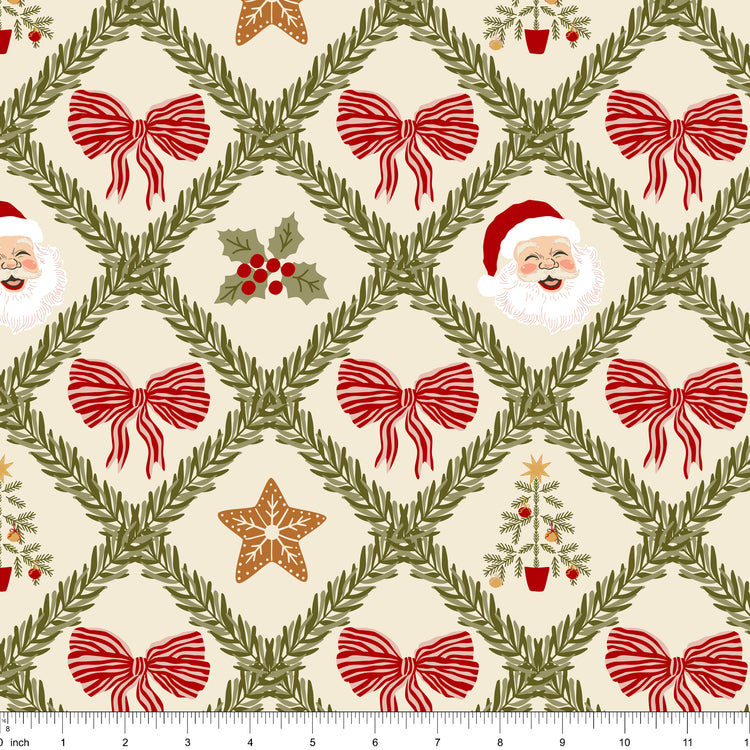 Cream fabric with a green pine garland trellis and red striped bows, shown with ruler for scale