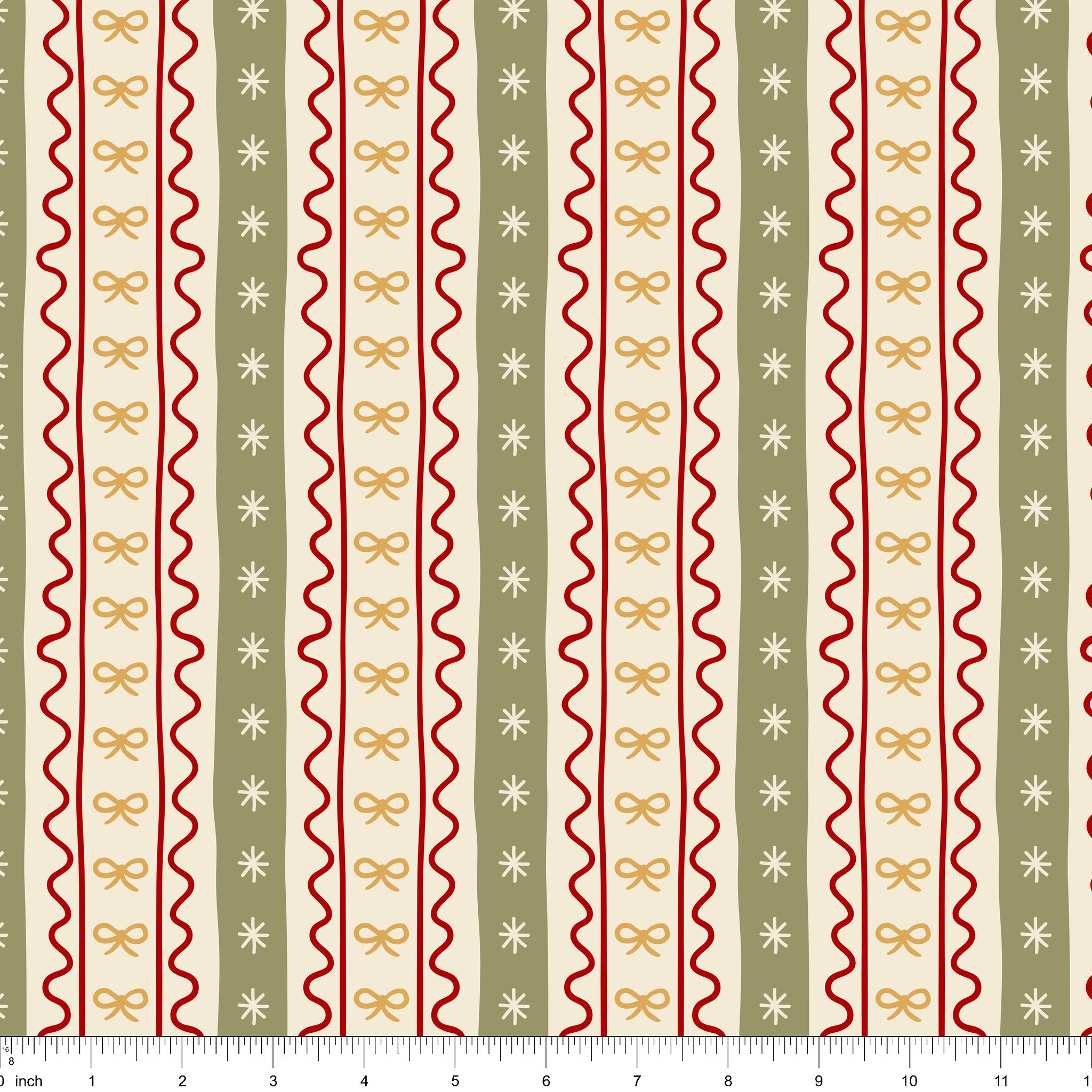 Cream fabric with vertical stripes of red ric rac, gold bows and sage bands with stars, shown with ruler for scale