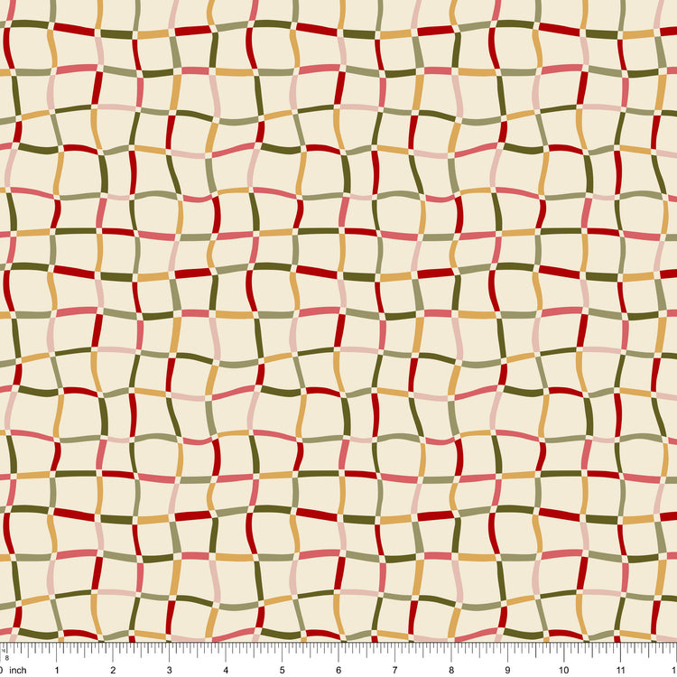 Cream fabric with a wavy red, green, gold and pink plaid, shown with ruler for scale