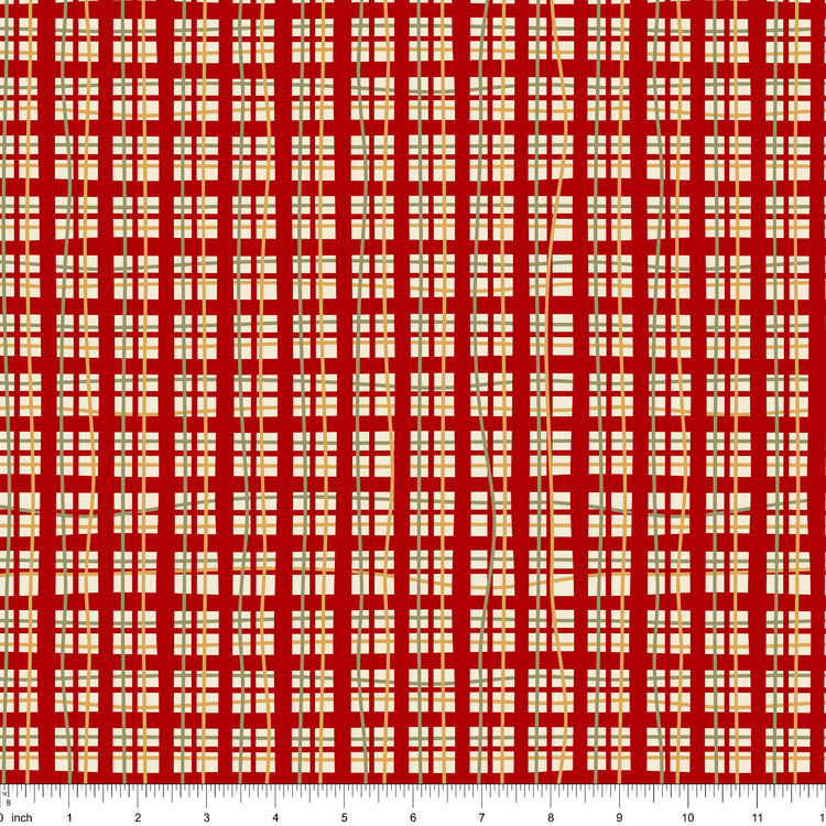 Cranberry red fabric with a cream and gold plaid, shown with ruler for scale