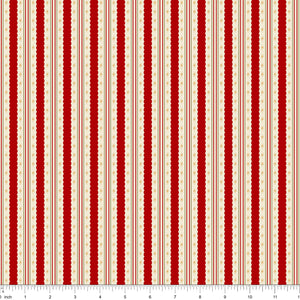 Cream fabric with red candy stripes, shown with ruler for scale