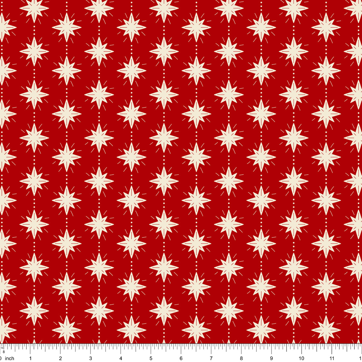 Cranberry red fabric with cream eight-point stars, shown with ruler for scale