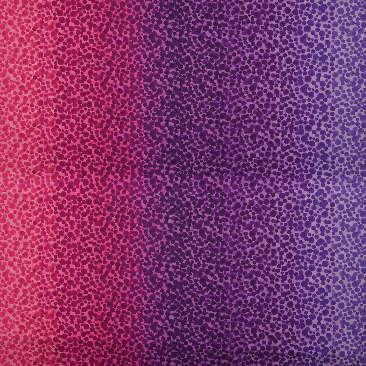 Bumbleberries Pinky Purple fabric featuring densely scattered watercolor-style dots transitioning from bright pink and magenta to deep purple and lavender.