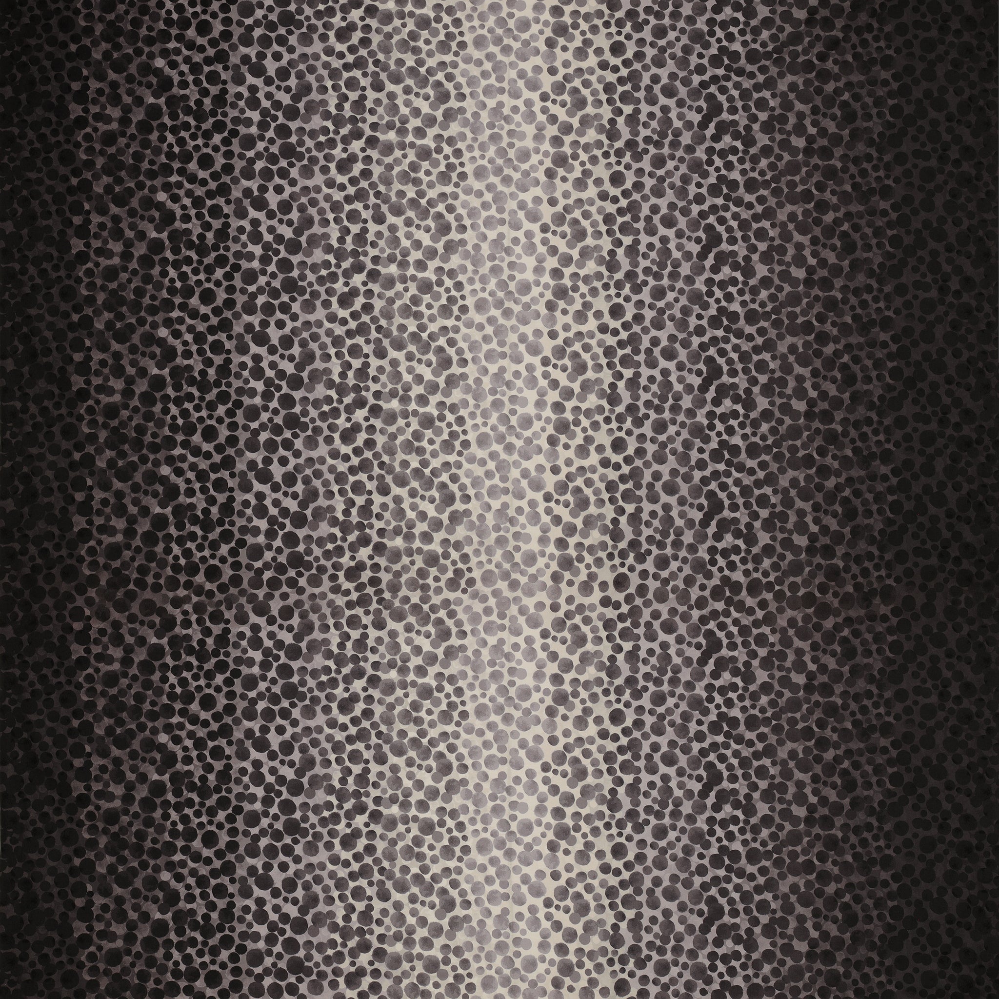 Bumbleberries Black to White fabric featuring scattered watercolor-style dots in black, charcoal, and gray on a light background.