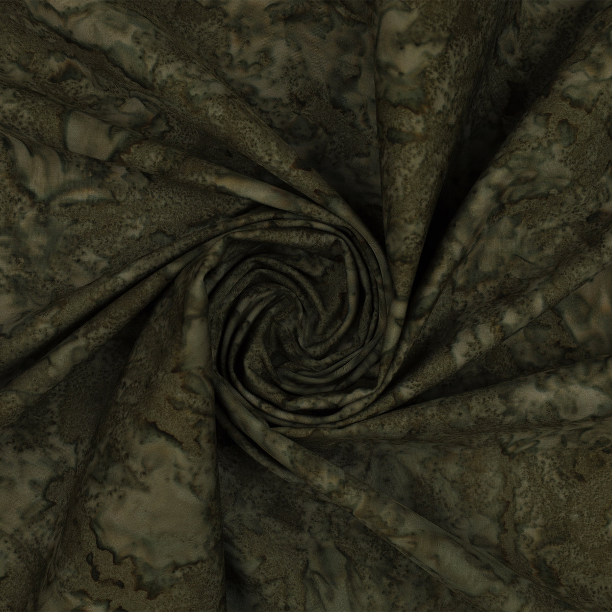 A close-up of draped fabric with an abstract marbled or mottled pattern in dark olive green, brown, and beige tones, arranged in a spiral fold.
