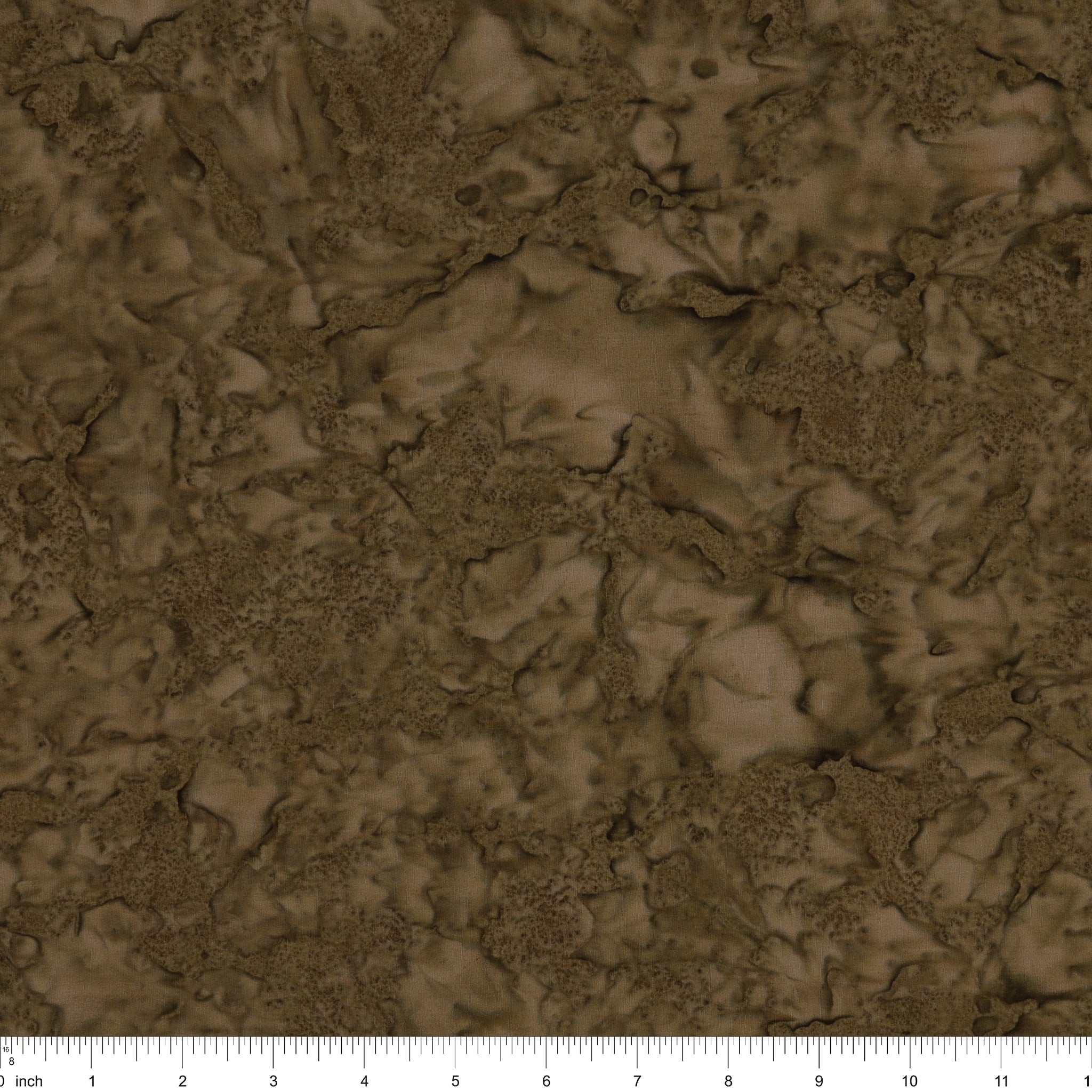 Brown marbled fabric texture with a ruler scale at the bottom indicating inches.