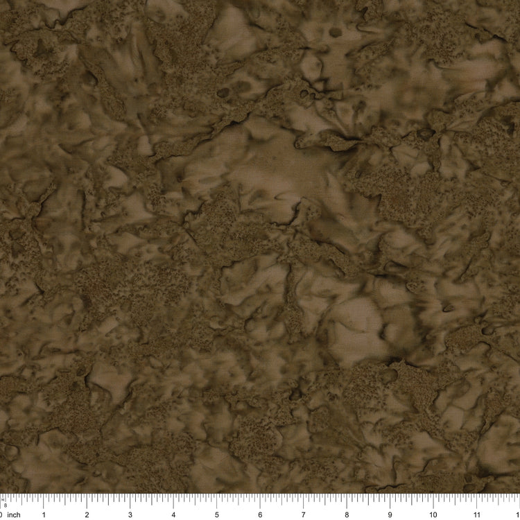 Brown marbled fabric texture with a ruler scale at the bottom indicating inches.