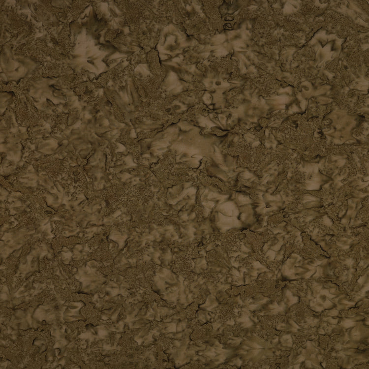 A close-up of a textured brown surface with organic, cracked, or marbled patterns in varying shades of earthy brown and tan.