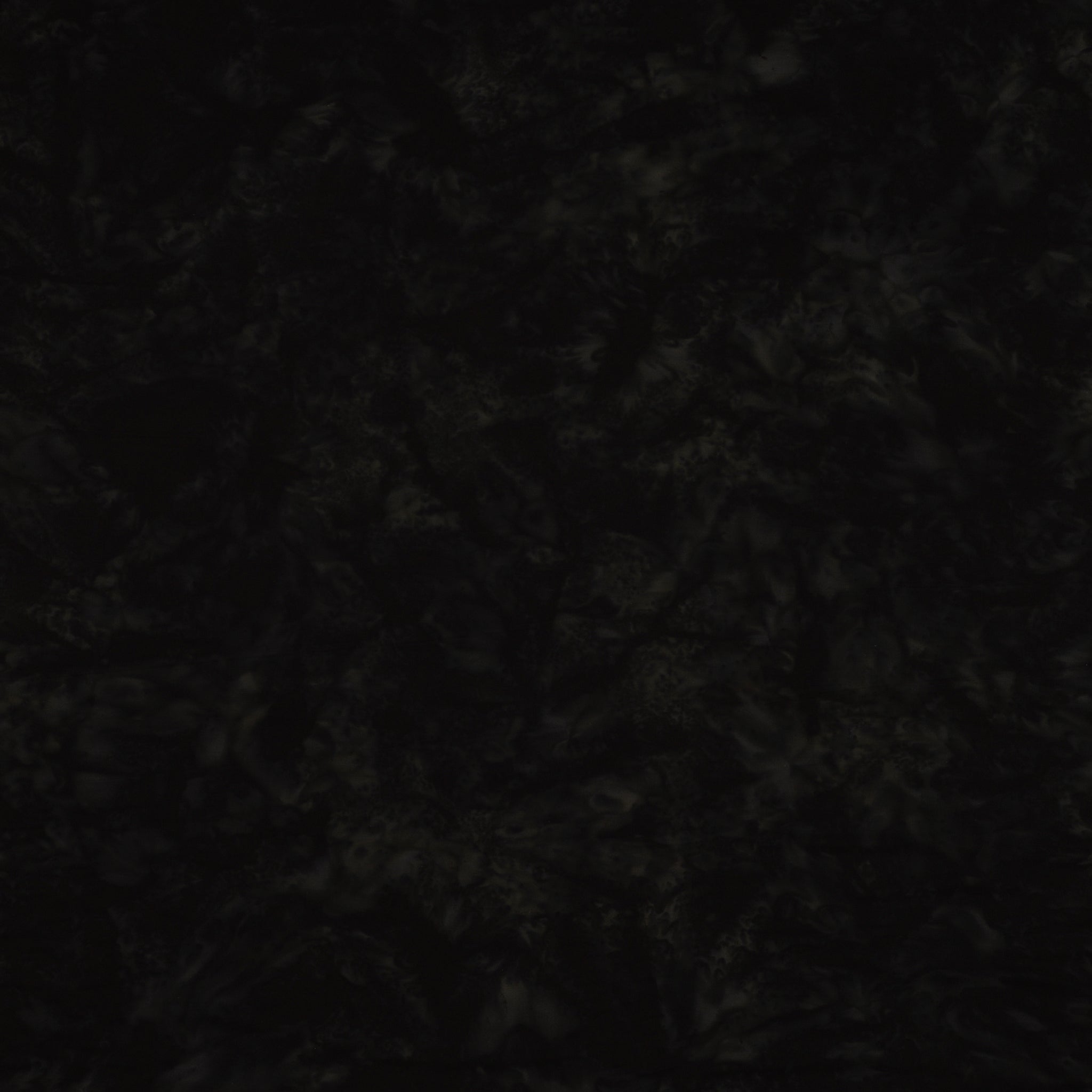 A close-up of a dark, mottled fabric with a subtle pattern in black and very dark gray.