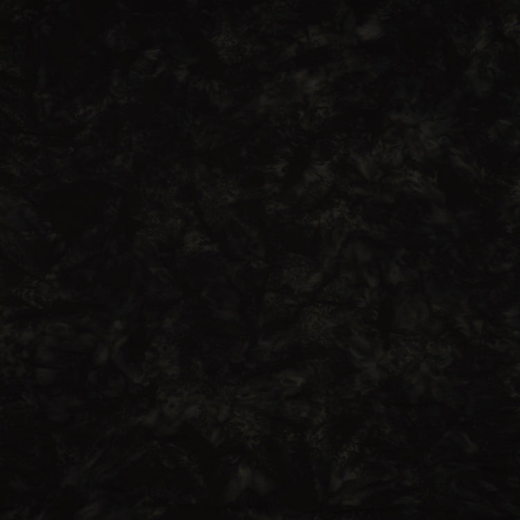 A close-up of a dark, mottled fabric with a subtle pattern in black and very dark gray.