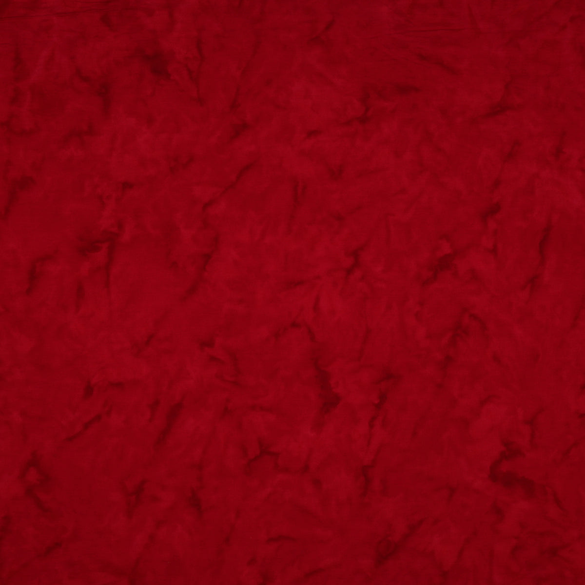 A close-up of a textured red fabric filling the entire frame.