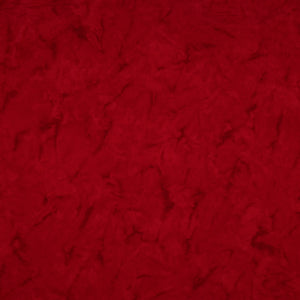 A close-up of a textured red fabric filling the entire frame.