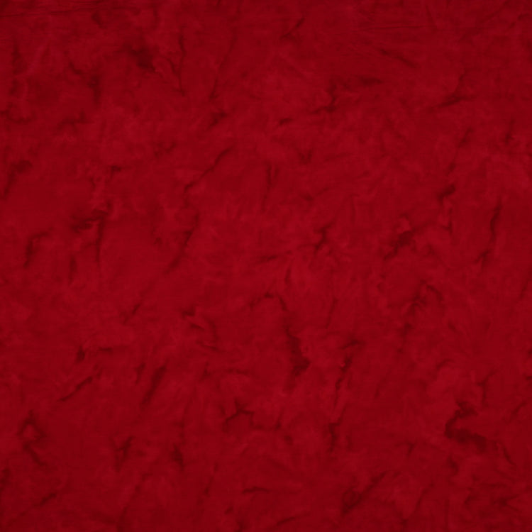 A close-up of a textured red fabric filling the entire frame.