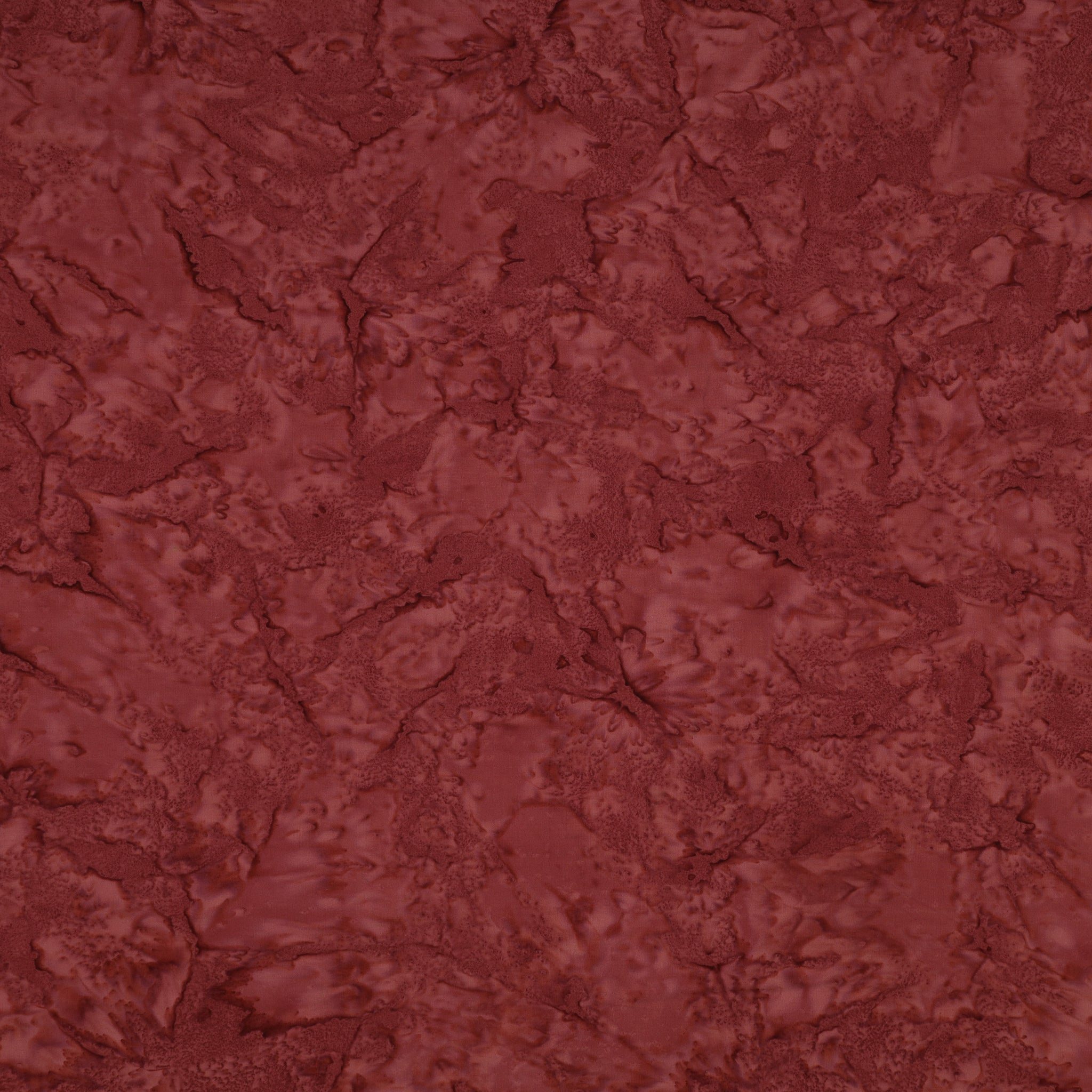 A close-up of a textured, marbled surface in a deep reddish-brown or burgundy tone, filling the entire frame.