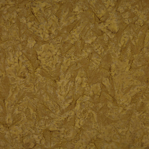 A close-up of a textured surface with a mottled, organic pattern in warm mustard yellow, golden brown, and tan tones.