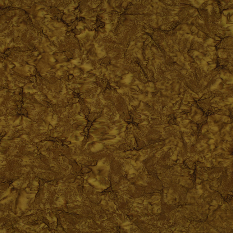 A close-up of a textured material swatch with a mottled, organic pattern in earthy brown and golden-brown tones.