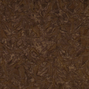 A close-up of a dark brown textured material with a mottled, organic pattern resembling cracked stone, bark, or aged leather.