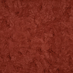 A close-up of a textured terracotta or rust-colored material with a mottled, organic surface pattern.