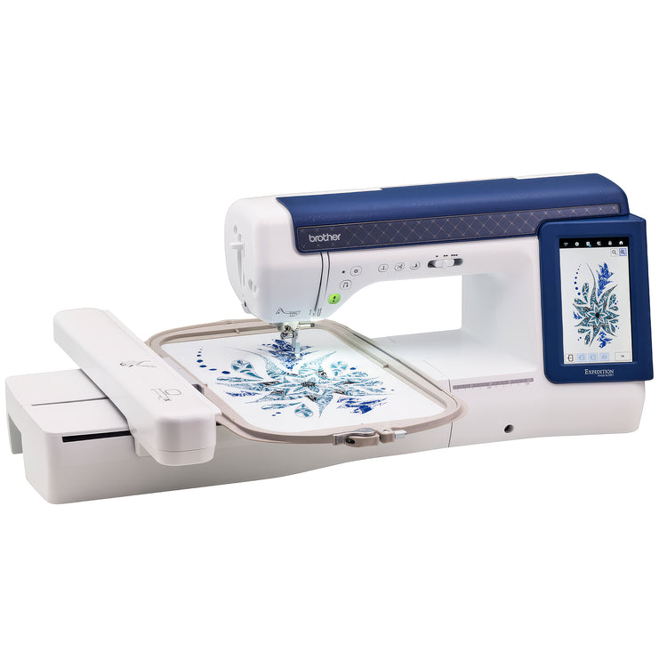 BX1 embroidery machine in white and navy blue, shown with an extended arm holding an embroidery hoop with blue floral embroidery in progress. A touch screen display on the right shows the design being created.