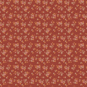 A seamless repeating floral pattern featuring small white and yellow flowers with green leaves on a warm terracotta red background.