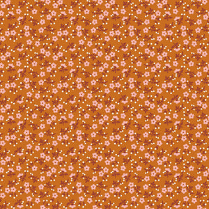 A repeating floral pattern on a warm orange-brown background, featuring small pink flowers, white dots, and muted reddish-brown stems.