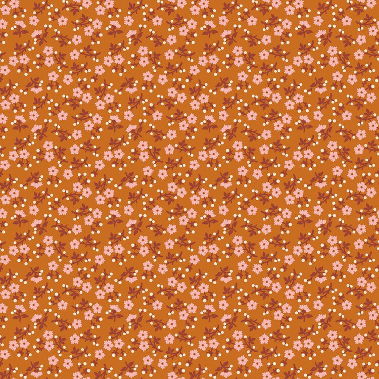A repeating floral pattern on a warm orange-brown background, featuring small pink flowers, white dots, and muted reddish-brown stems.