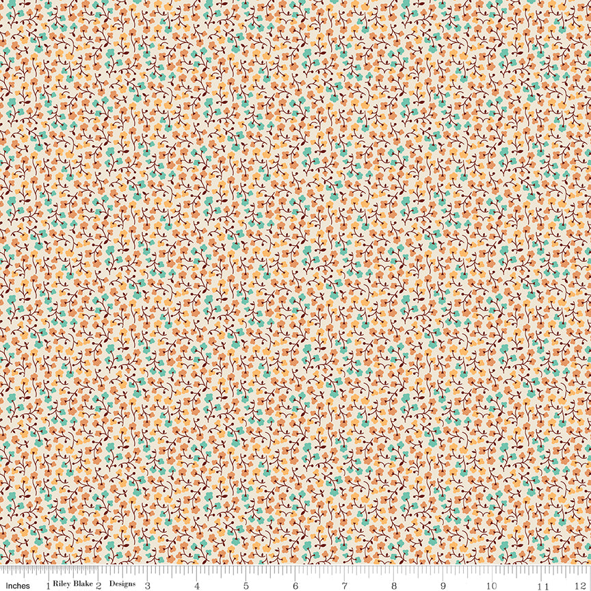 Floral patterned fabric with a ruler at the bottom for scale